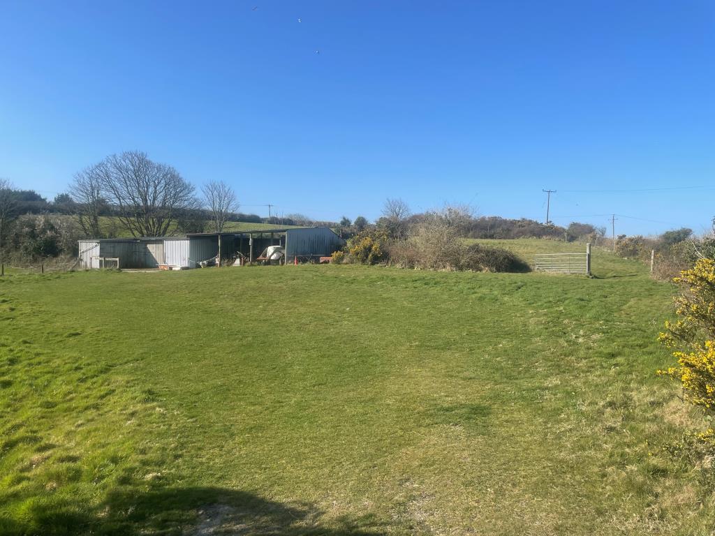 Lot: 9 - LAND WITH STABLE BLOCK AND BARN - View of field with buildings